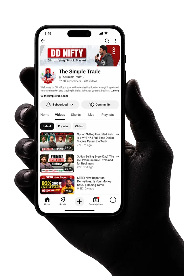 A hand holding a phone open on The Simple Trade YouTube channel